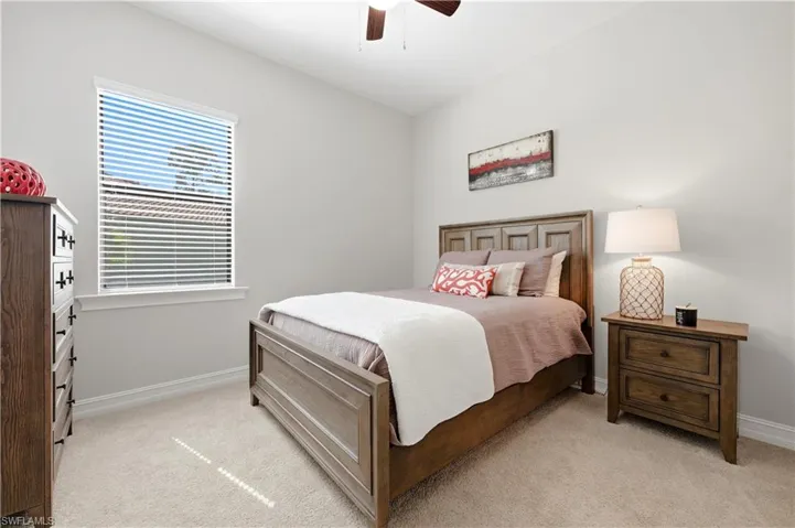 3rd Bedroom with ceiling fan and spacious closet