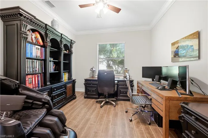 Spacious Home Office with room for double desks and a Bookshelf
