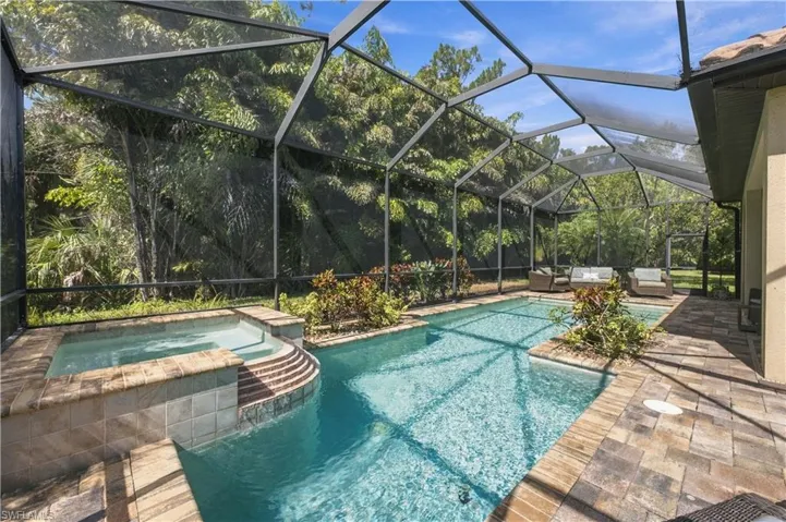 Swimming Pool with a hot tub/ Spa