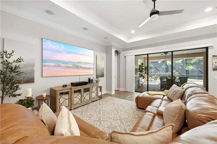 Spacious Living Room with natural Light and high Ceiling