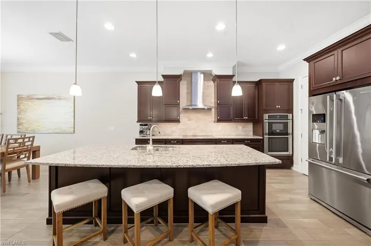 Gorgeous Kitchen with a large island and bar stools