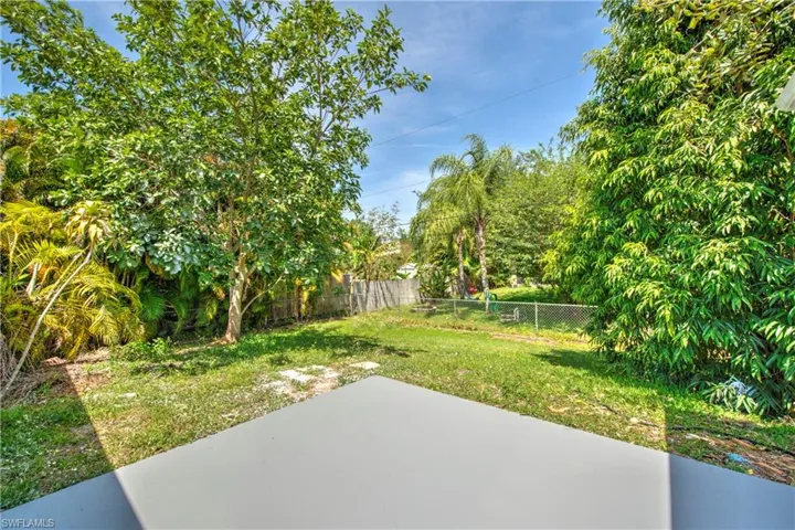 View of yard with a patio and a fenced backyard