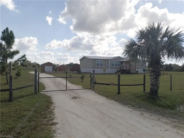 FRONT GATE/NEW DRIVE WAY