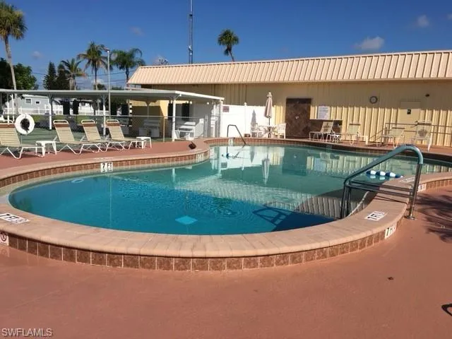 View of swimming pool with a patio
