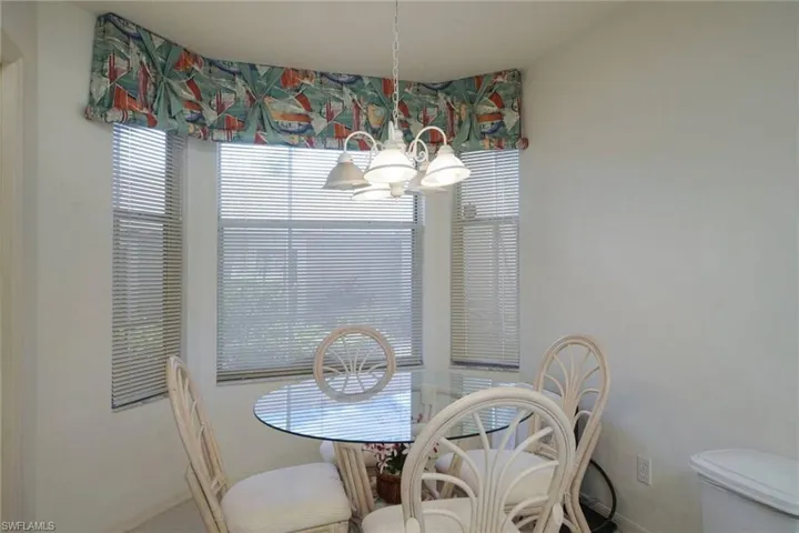 Dining room with a notable chandelier