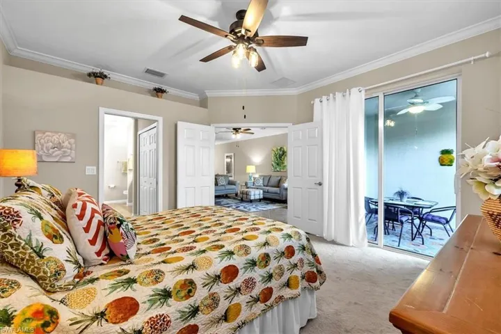 View of owner's suite with lanai to right and bathroom to the left