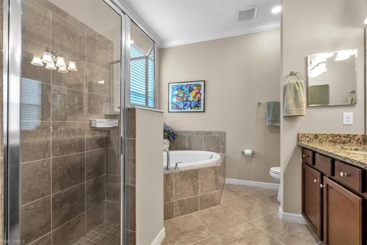 Tiled shower in owner's suite