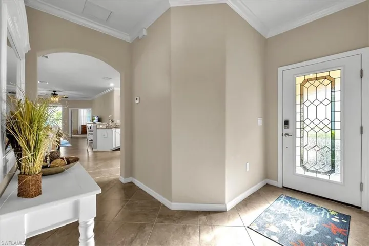 Airy welcoming foyer with glass door