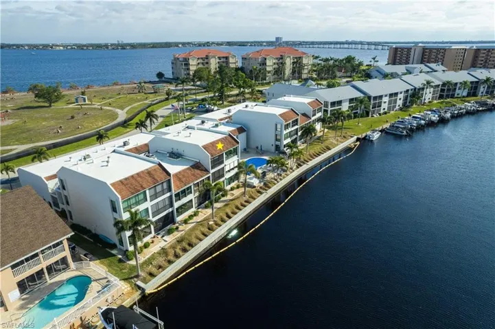 DIRECT ACCESS to the WATERWAYS via the expansive 200+ ft wide canal, conveniently positioned just a turn away from the Caloosahatchee RIVER and the boundless expanse of the GULF of Mexico