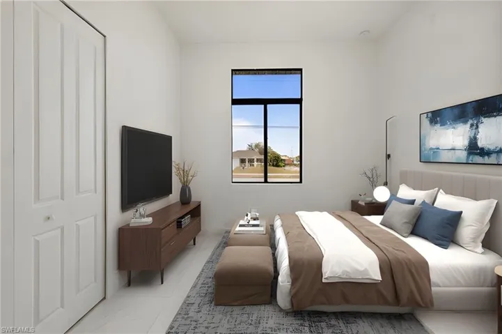 Bedroom with marble finish floor
