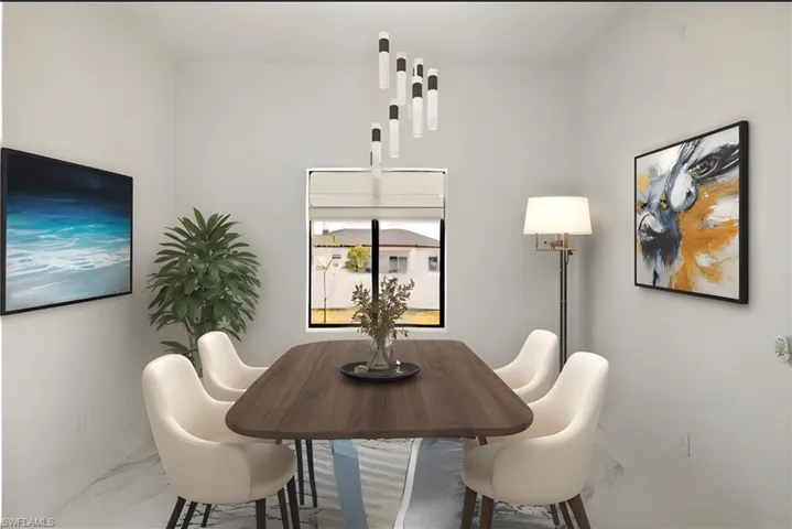 Dining space with marble finish floor and baseboards