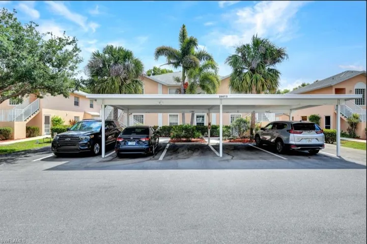 View of front of property with covered parking