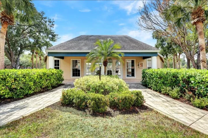 Bungalow-style house featuring stucco siding