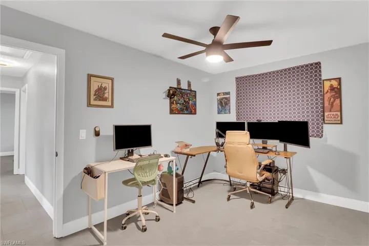 Bedroom THREE of FOUR or can be doubled as an in home Office with a closet and ceiling fan