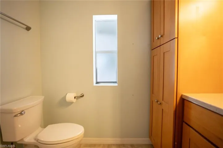 Bathroom with toilet and vanity