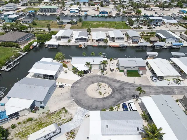 View of property location featuring nearby suburban area and a nearby body of water