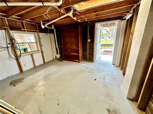 Extra storage under the property with a fully functioning 1/2 bathroom in side room adjacent to it.