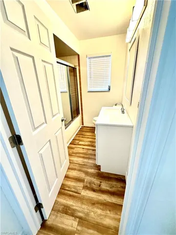 2nd bathroom with tub/shower combo and newer cabinets and flooring