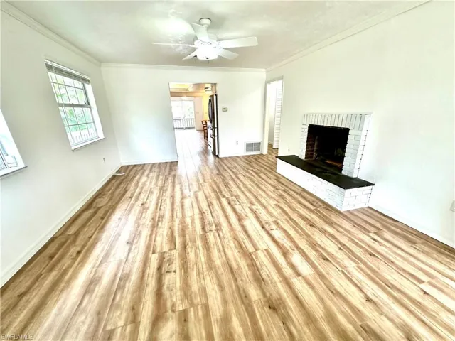 Living room/Great room leads into the kitchen which leads to another balcony that overlooks the canal.