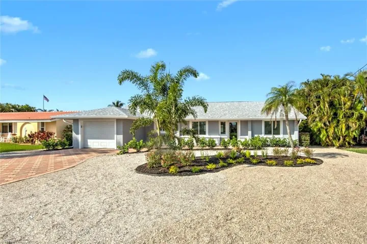 Single story home with a garage