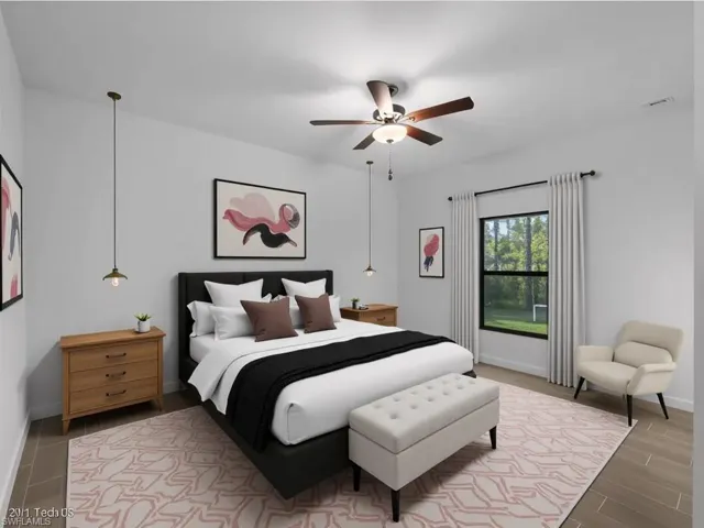 Virtually staged Bedroom featuring a ceiling fan and wood finish floors
