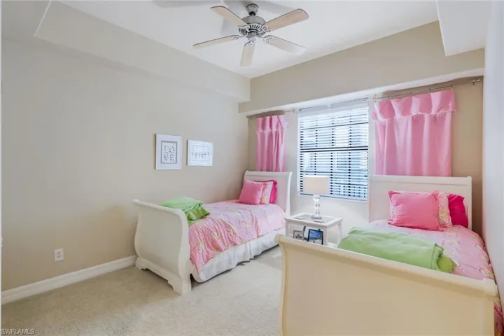 Large 2nd Bedroom featuring large walk in closet and ensuite bath with walk in shower.