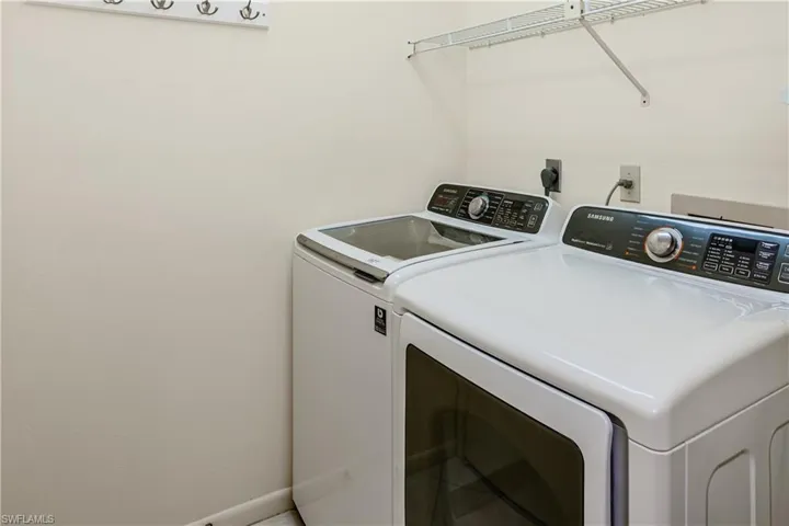Clothes washing area with washer and dryer