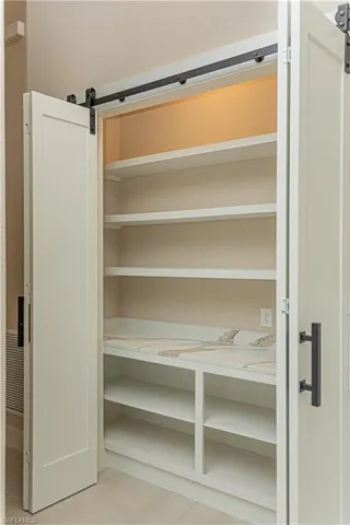 Upgraded pantry, custom lighting, added electric, custom shelving