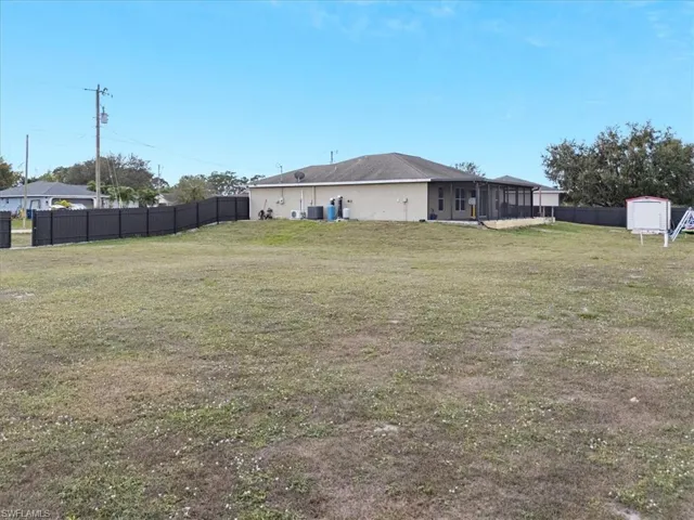 View of yard with central AC unit