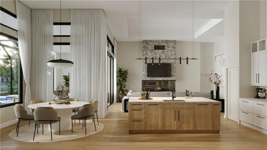 Kitchen featuring white cabinetry, a high ceiling, light wood-look tile flooring, hanging light fixtures, and glass insert cabinets
