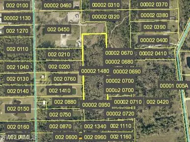 Aerial map of property and surrounding area featuring property parcel outlined