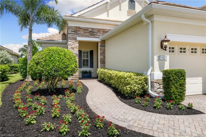 Entrance to property with a garage