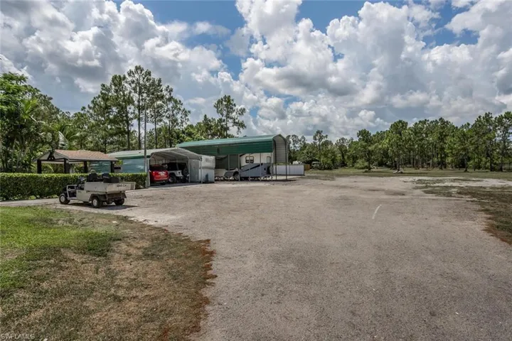 View of car parking with a carport