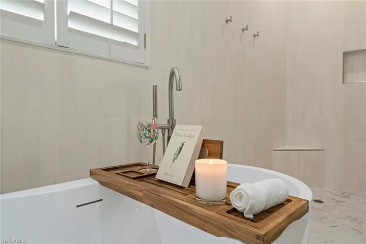 Freestanding soaking tub and walk-in shower