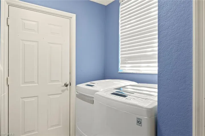 Laundry area featuring washing machine and dryer