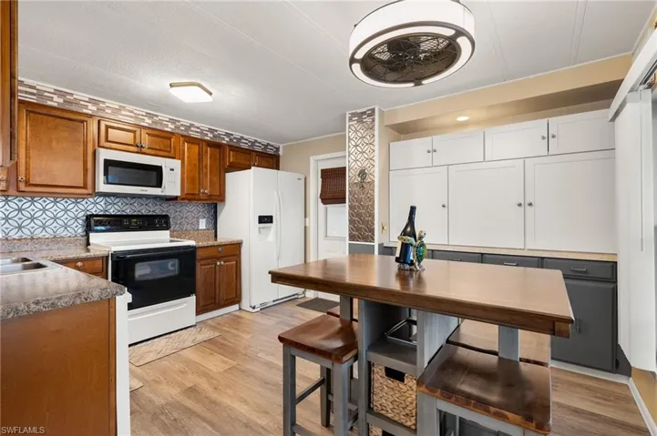 Additional Built-in Cabinet Storage & Modern Ceiling Fan