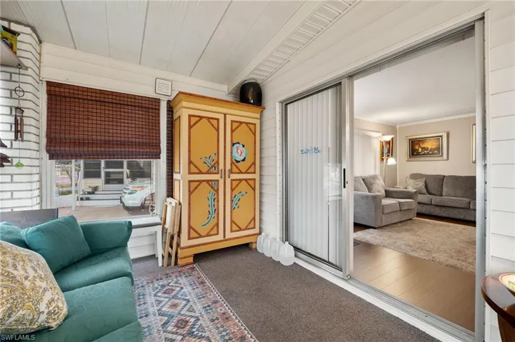 Sunroom attached to Front Patio and Living Area