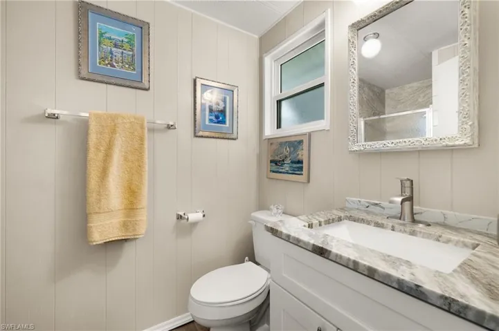Bathroom with Vanity and Tile Shower