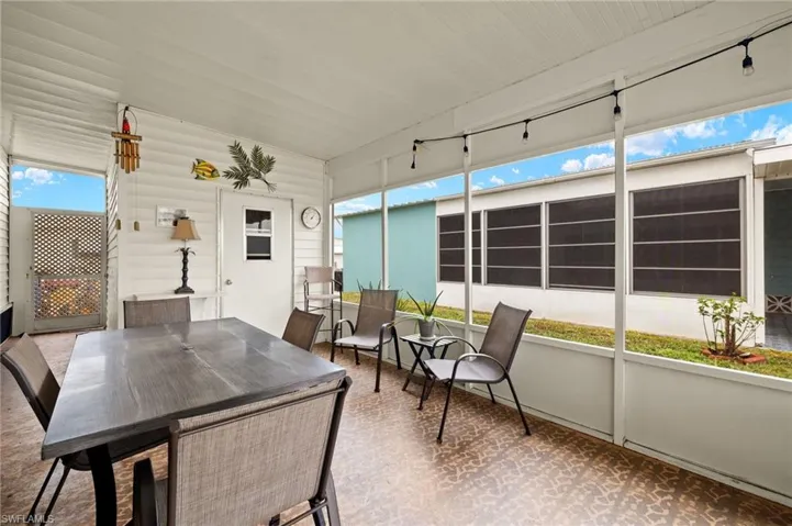 Patio under Carport with Shed Storage