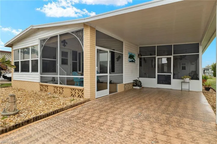 Covered Carport & Two Screened Patios