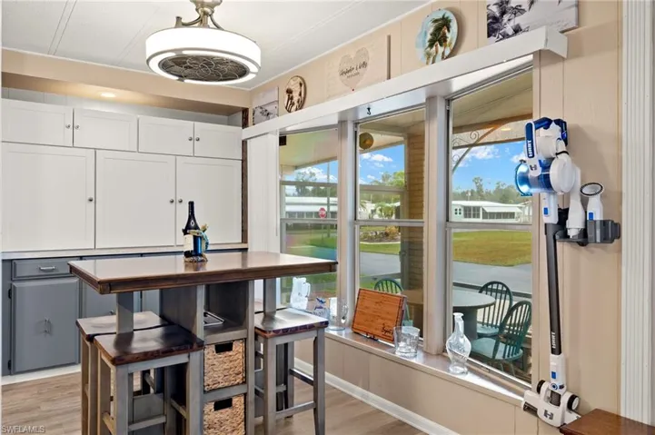 View of Front Patio through Bay Windows