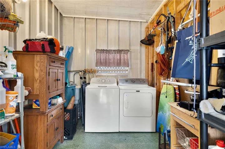 Shed with Washer/Dryer, Utility Sink, and Plenty of Storage.