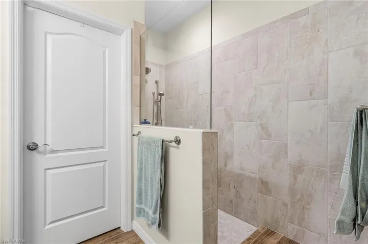 Full bathroom featuring a walk in shower