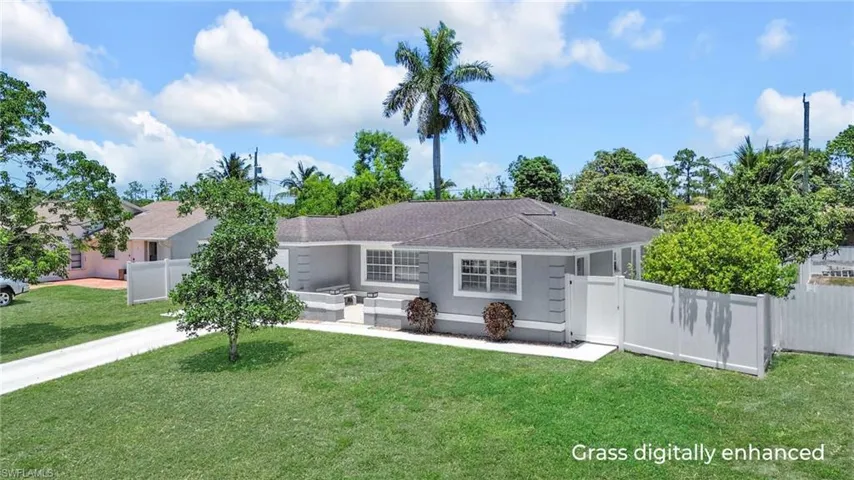 Single story home with stucco siding and roof with shingles