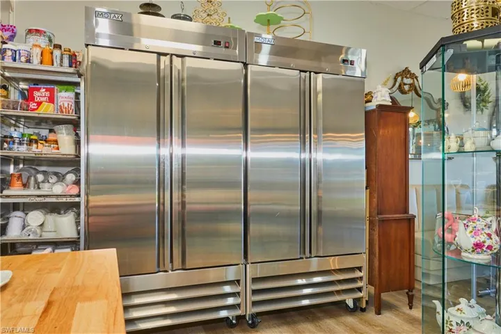 Kitchen with wood counters and wood finished floors