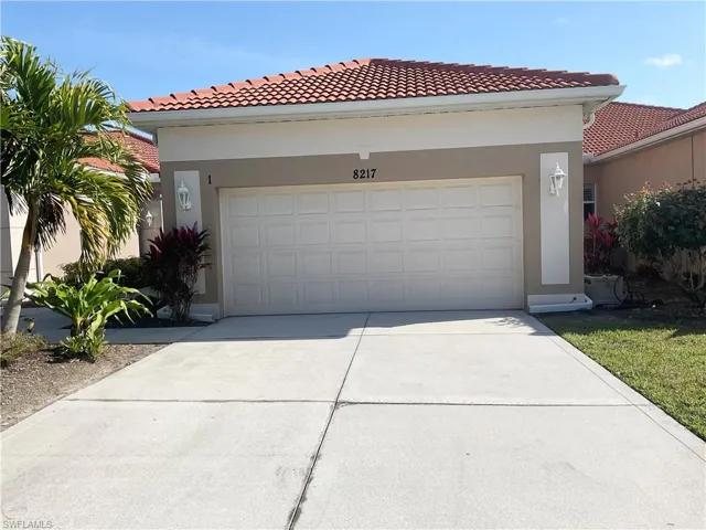 View of front of property with a 2-car garage