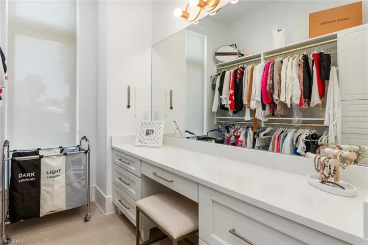 Walk-in closet with vanity
