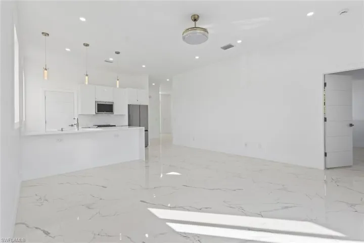 living room with recessed lighting