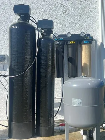 Exterior view of a water softener and pump (5 stage water filter system)