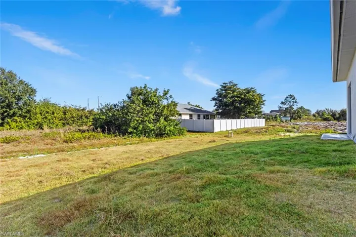 View of yard ; room for a pool.